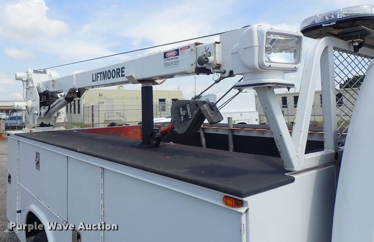 image for item DE0872 2011 Ford F550 Super Duty XL SuperCab utility bed truck with crane