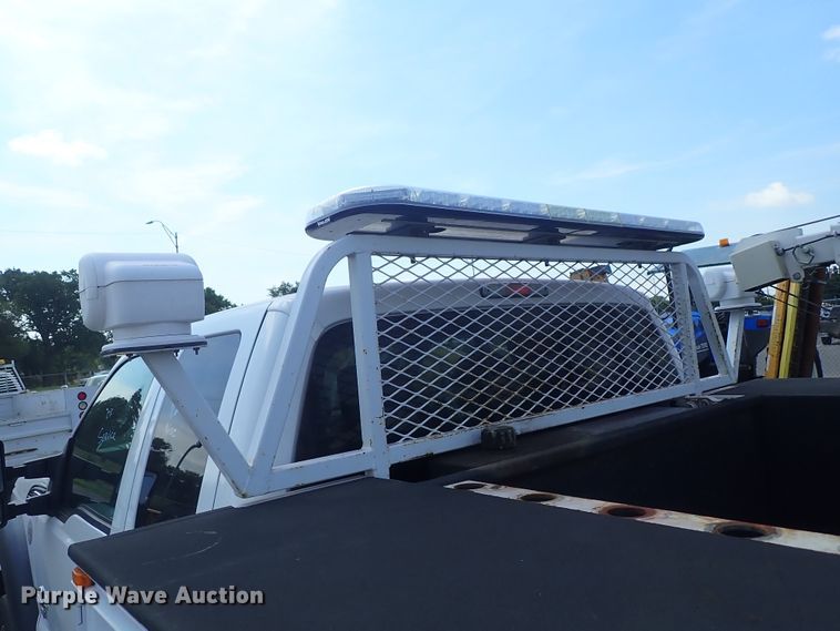 image for item DE0872 2011 Ford F550 Super Duty XL SuperCab utility bed truck with crane