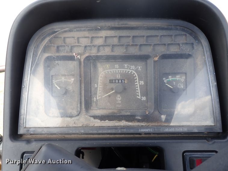 image for item DE0883 2002 New Holland TS110 MFWD tractor