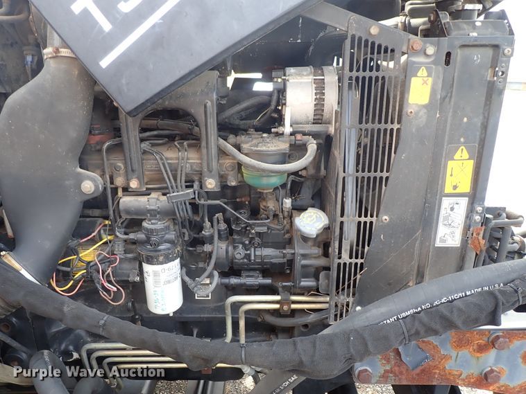 image for item DE0883 2002 New Holland TS110 MFWD tractor