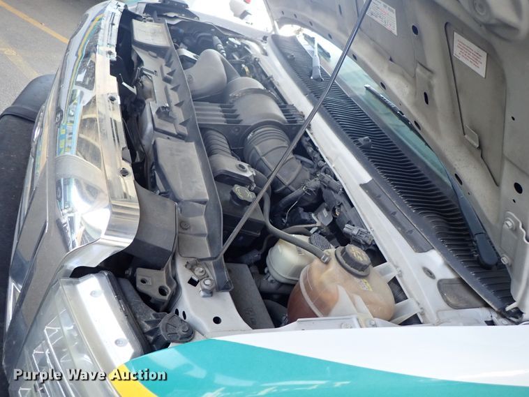 image for item DE0890 2010 Ford E450 Super Duty shuttle bus