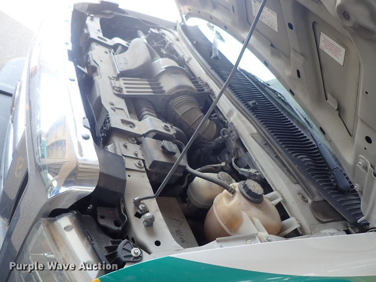 image for item DE0891 2010 Ford E450 Super Duty shuttle bus