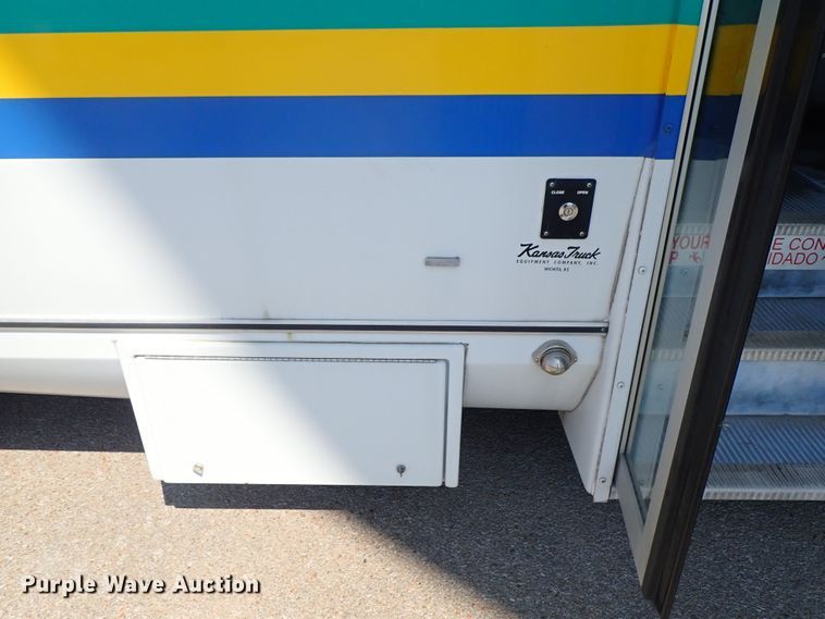 image for item DE0891 2010 Ford E450 Super Duty shuttle bus