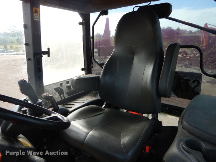 image for item DH6070 2000 New Holland TM115 MFWD tractor