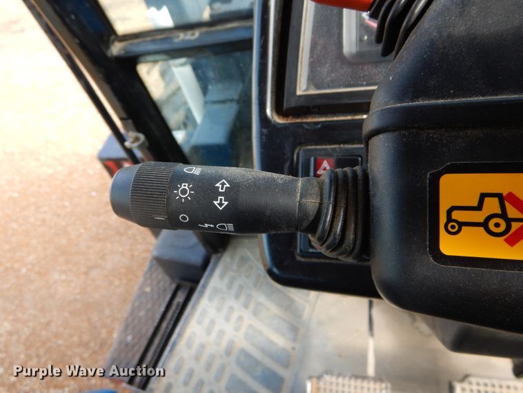 image for item DH6070 2000 New Holland TM115 MFWD tractor