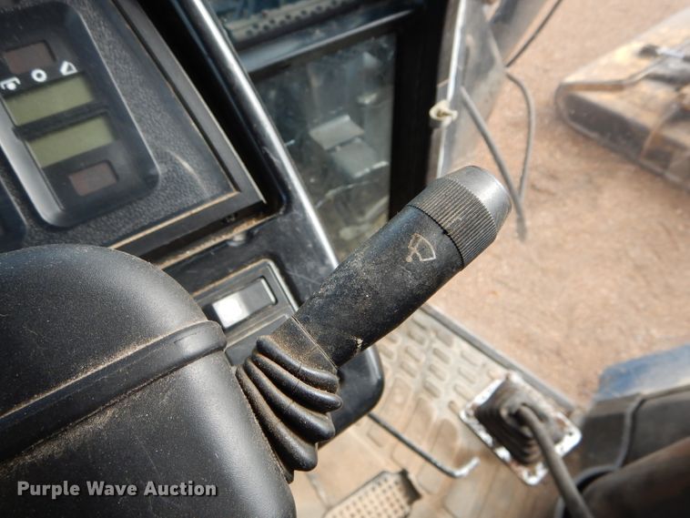 image for item DH6070 2000 New Holland TM115 MFWD tractor