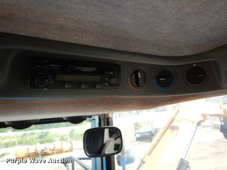 image for item DH6070 2000 New Holland TM115 MFWD tractor