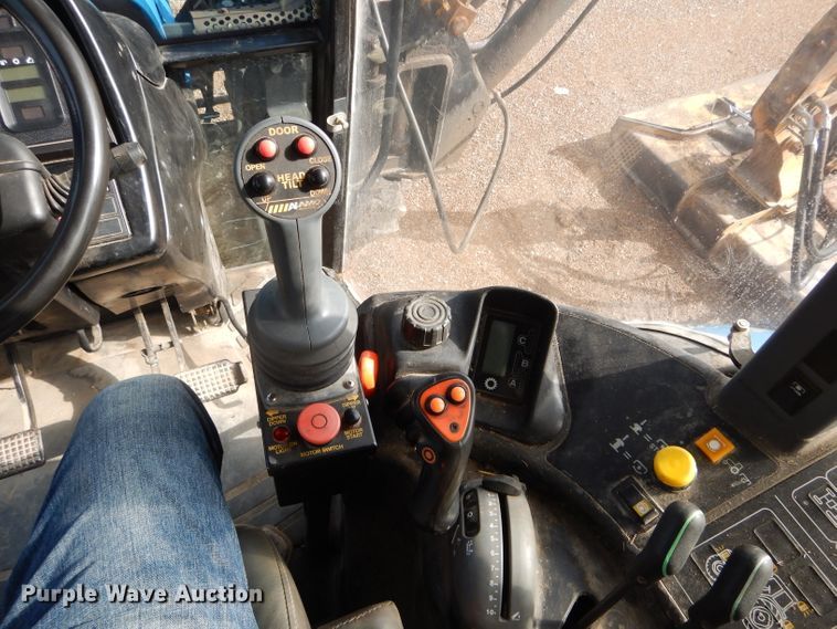 image for item DH6070 2000 New Holland TM115 MFWD tractor