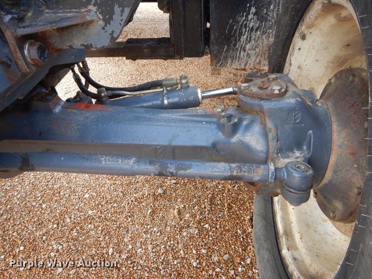 image for item DH6070 2000 New Holland TM115 MFWD tractor