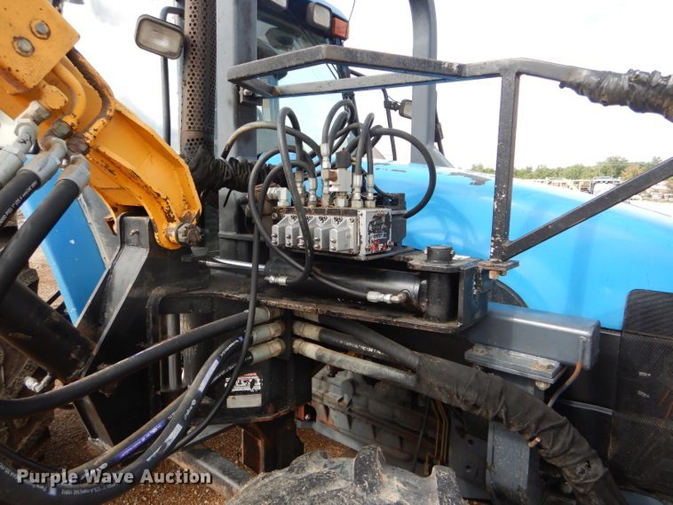 image for item DH6070 2000 New Holland TM115 MFWD tractor