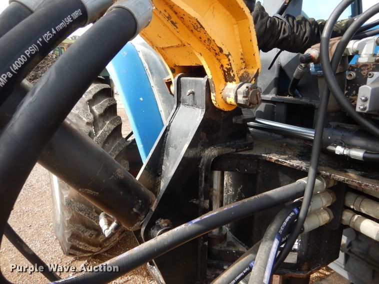 image for item DH6070 2000 New Holland TM115 MFWD tractor