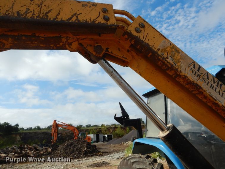 image for item DH6070 2000 New Holland TM115 MFWD tractor