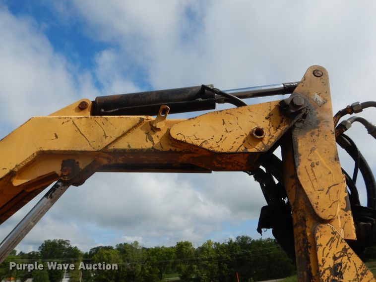 image for item DH6070 2000 New Holland TM115 MFWD tractor