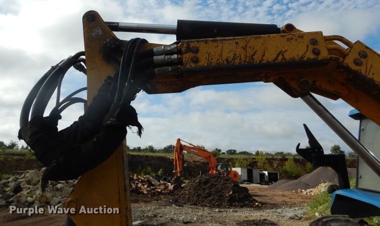 image for item DH6070 2000 New Holland TM115 MFWD tractor