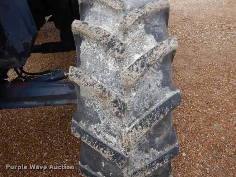 image for item DH6070 2000 New Holland TM115 MFWD tractor