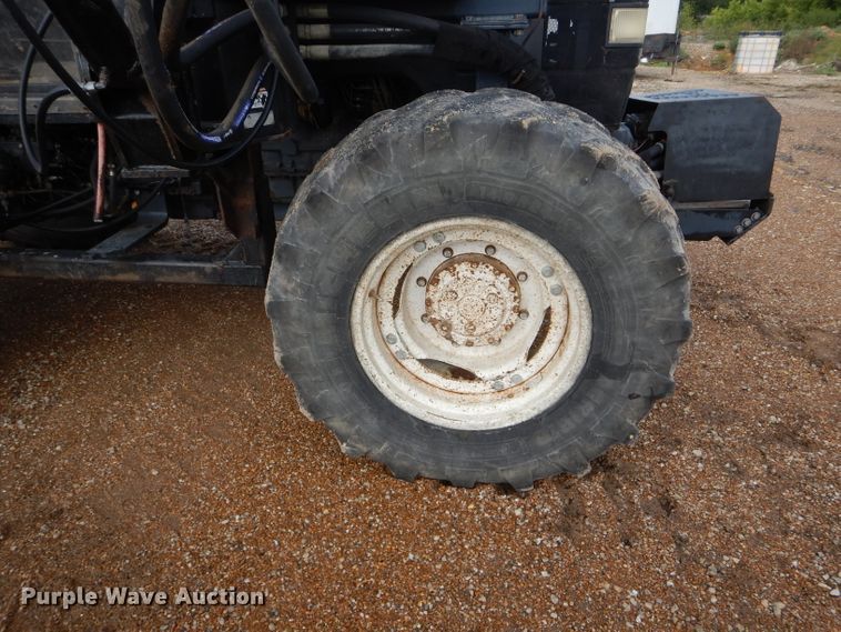 image for item DH6070 2000 New Holland TM115 MFWD tractor