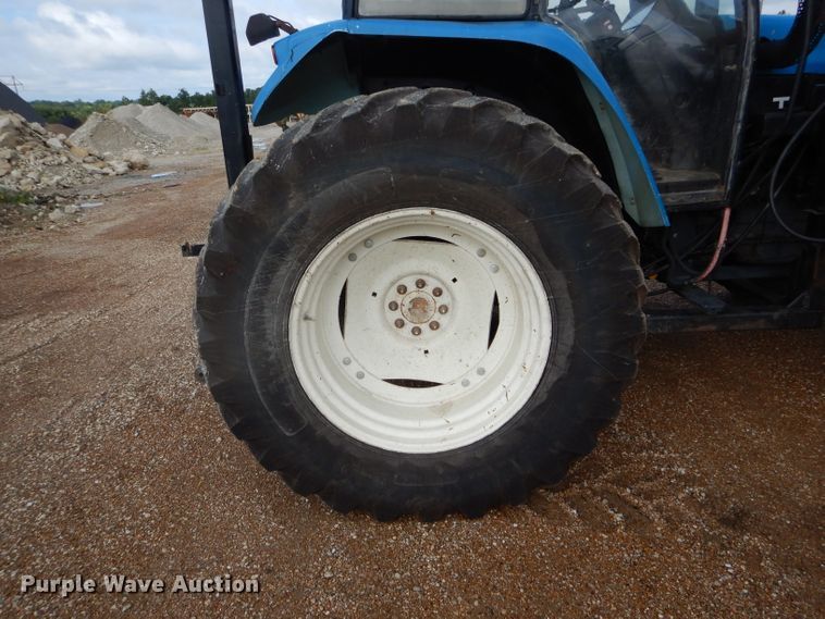 image for item DH6070 2000 New Holland TM115 MFWD tractor