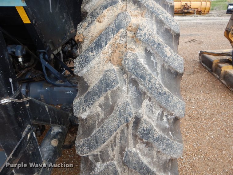 image for item DH6070 2000 New Holland TM115 MFWD tractor