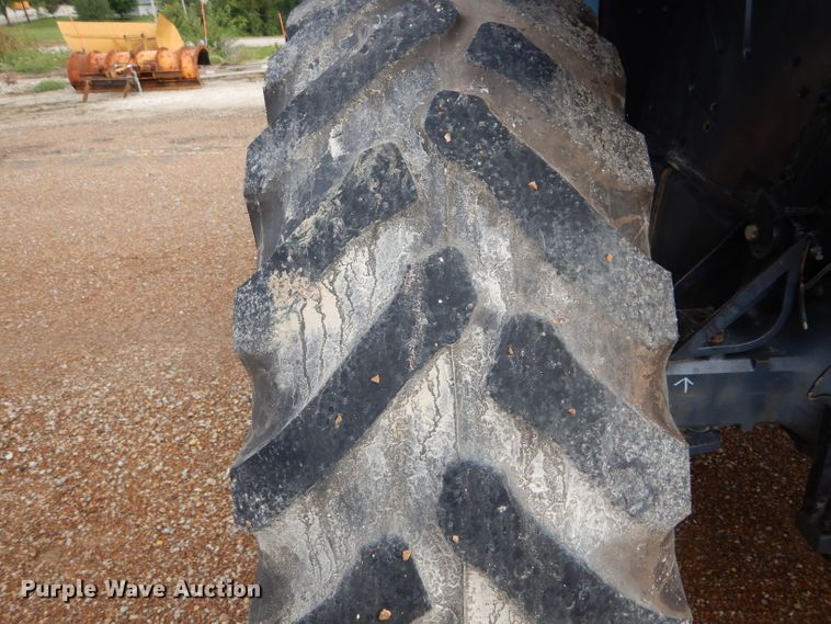 image for item DH6070 2000 New Holland TM115 MFWD tractor