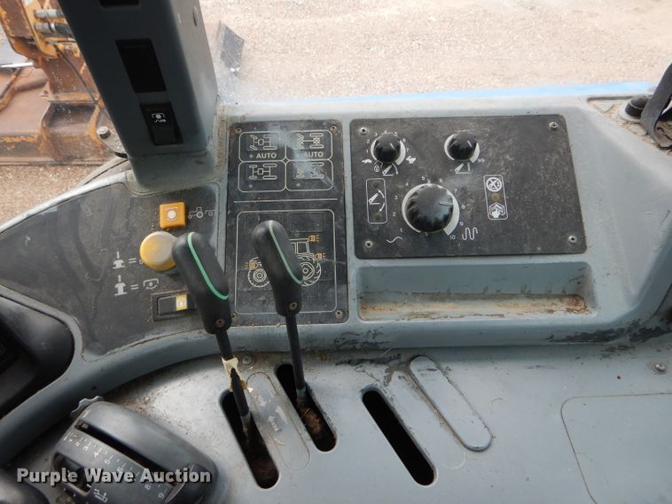 image for item DH6071 2000 New Holland TM115 MFWD tractor