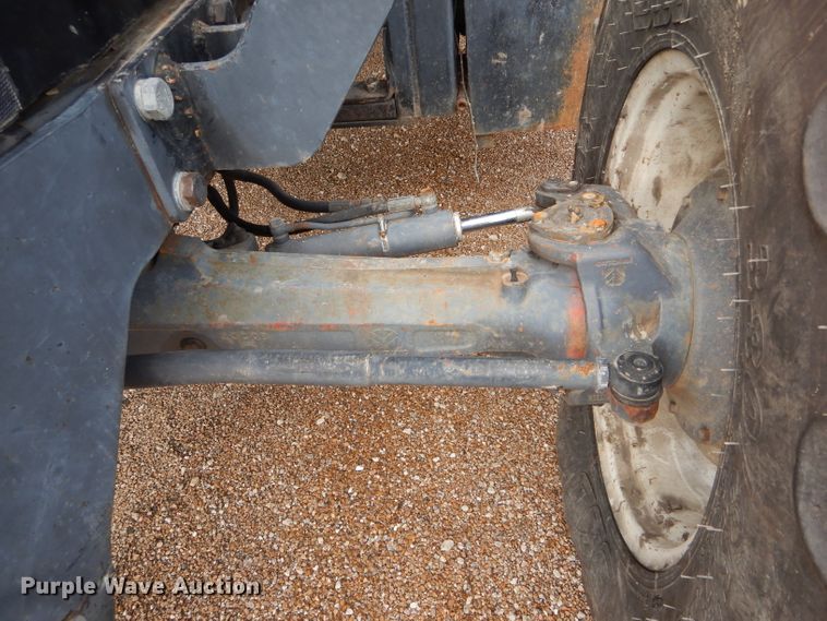 image for item DH6071 2000 New Holland TM115 MFWD tractor