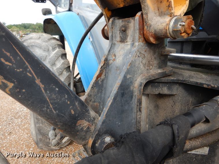 image for item DH6071 2000 New Holland TM115 MFWD tractor