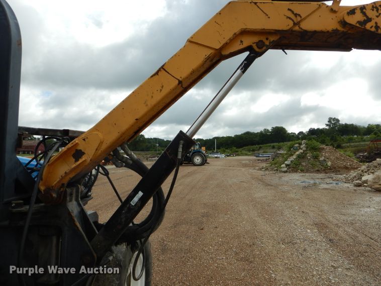 image for item DH6071 2000 New Holland TM115 MFWD tractor