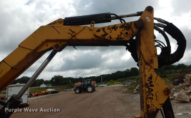 image for item DH6071 2000 New Holland TM115 MFWD tractor