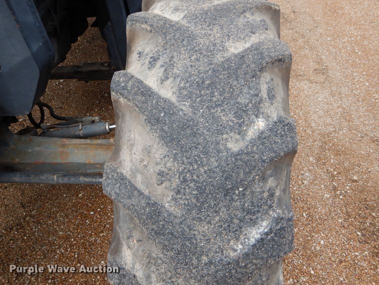 image for item DH6071 2000 New Holland TM115 MFWD tractor