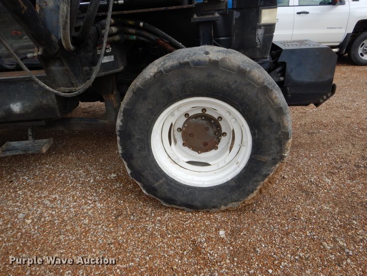 image for item DH6071 2000 New Holland TM115 MFWD tractor