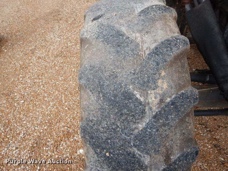 image for item DH6071 2000 New Holland TM115 MFWD tractor