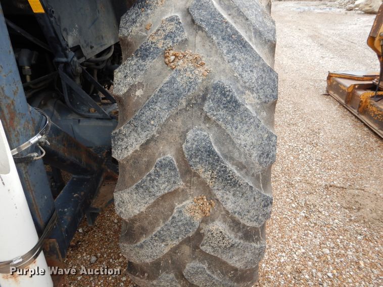 image for item DH6071 2000 New Holland TM115 MFWD tractor