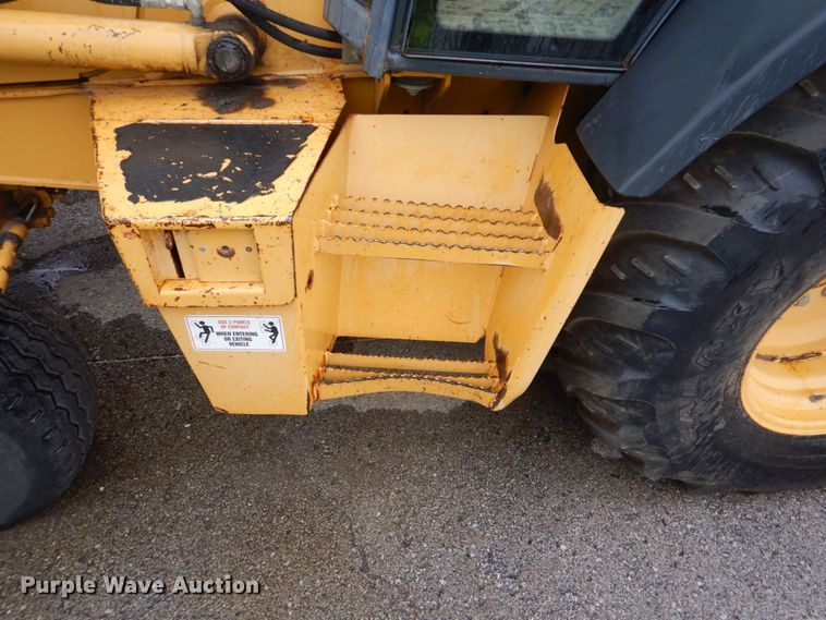 image for item DI2280 2004 John Deere 310SG backhoe