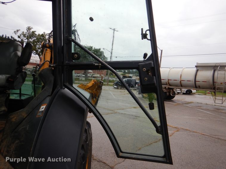 image for item DI2280 2004 John Deere 310SG backhoe