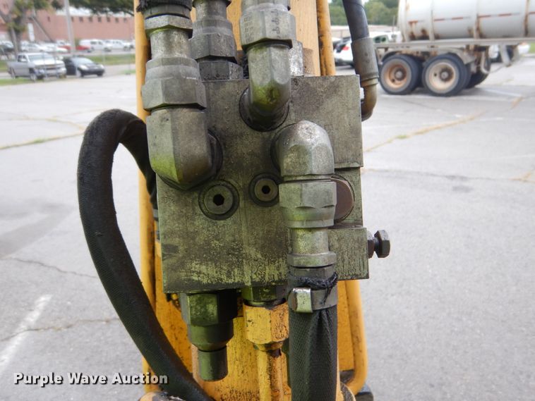 image for item DI2280 2004 John Deere 310SG backhoe