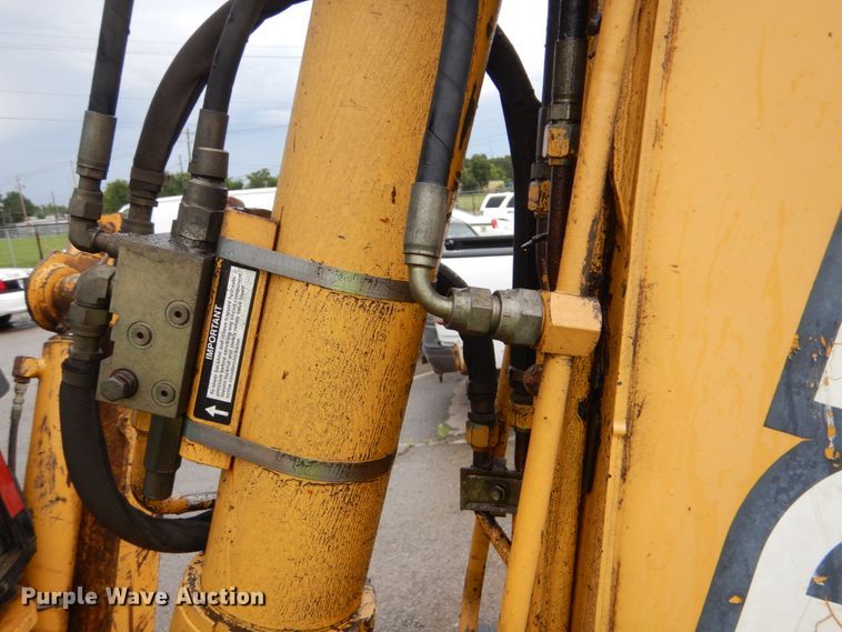 image for item DI2280 2004 John Deere 310SG backhoe