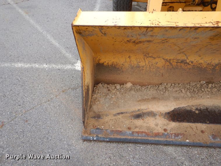 image for item DI2280 2004 John Deere 310SG backhoe