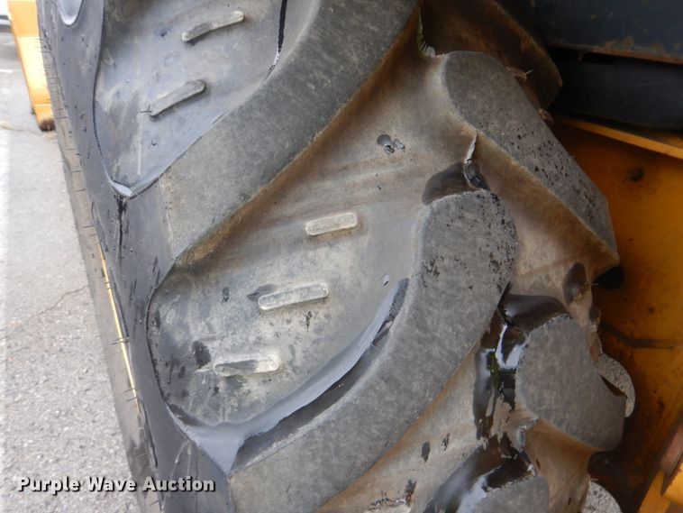 image for item DI2280 2004 John Deere 310SG backhoe