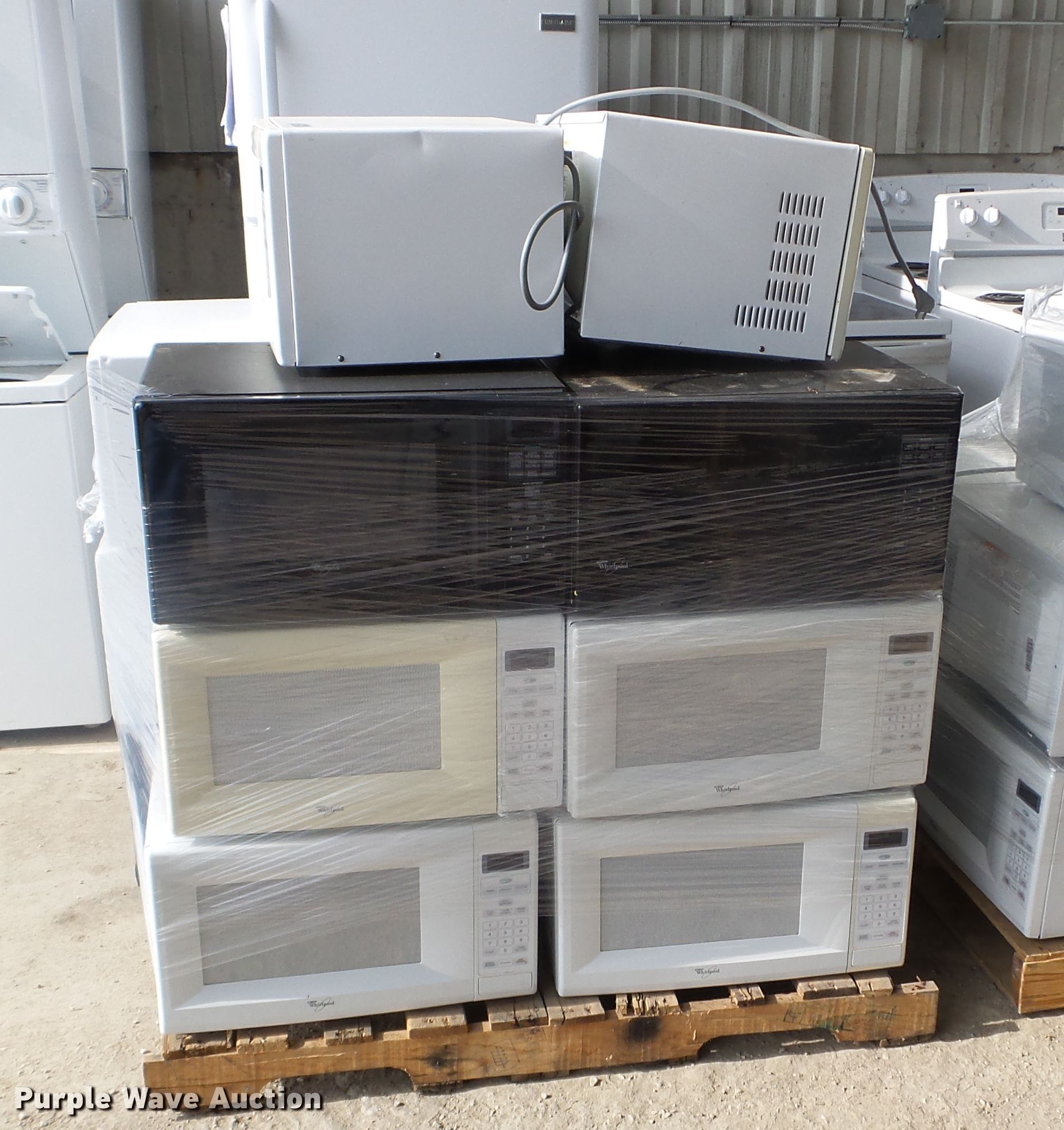 (20) Whirlpool microwaves in Des Moines, IA Item FM9395 sold Purple