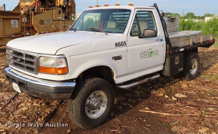 image for item DD6396 1997 Ford F350 flatbed pickup truck