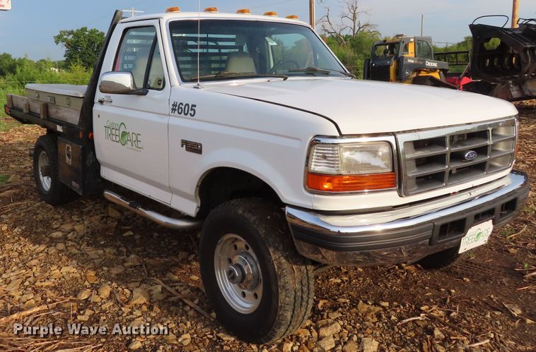 image for item DD6396 1997 Ford F350 flatbed pickup truck