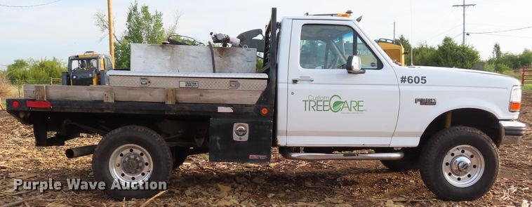 image for item DD6396 1997 Ford F350 flatbed pickup truck