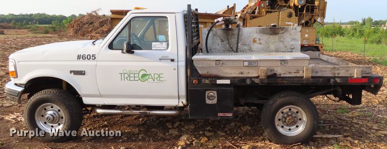 image for item DD6396 1997 Ford F350 flatbed pickup truck