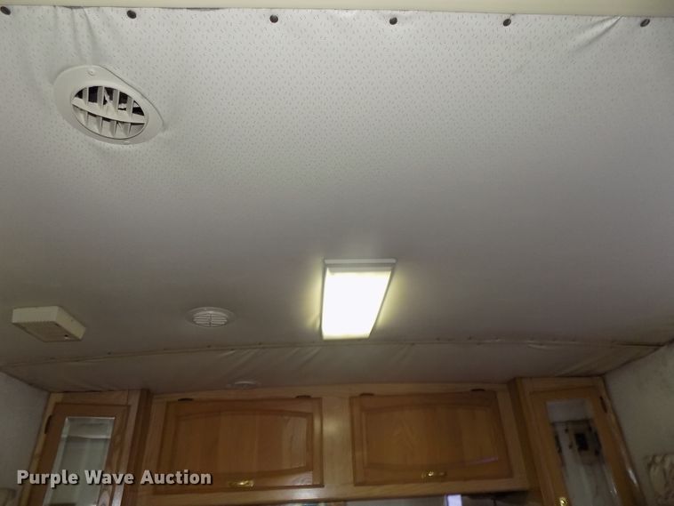 image for item DE7753 1994 Winnebago Vector RV