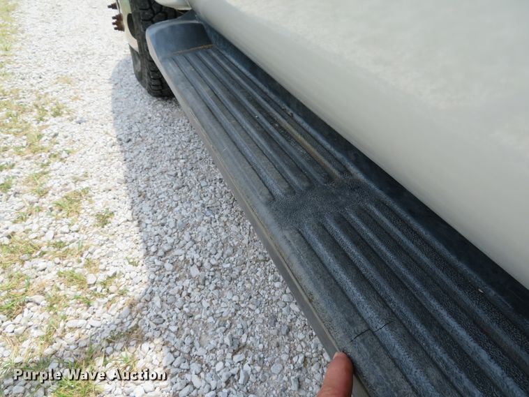 image for item DE8258 2006 Ford F350 Super Duty XLT Crew Cab utility bed pickup truck