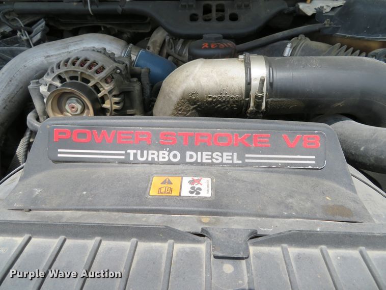 image for item DE8258 2006 Ford F350 Super Duty XLT Crew Cab utility bed pickup truck