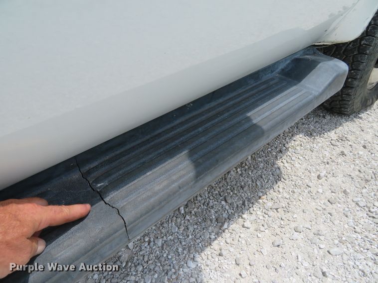 image for item DE8258 2006 Ford F350 Super Duty XLT Crew Cab utility bed pickup truck