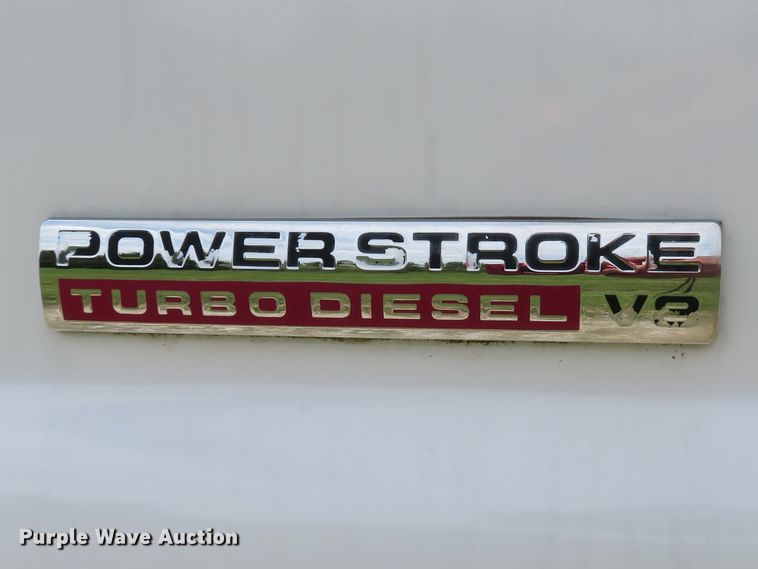 image for item DE8258 2006 Ford F350 Super Duty XLT Crew Cab utility bed pickup truck