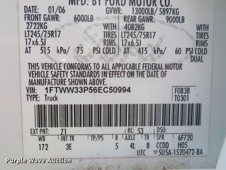 image for item DE8258 2006 Ford F350 Super Duty XLT Crew Cab utility bed pickup truck