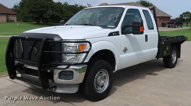 image for item FE9748 2011 Ford F250 Super Duty XL SuperCab flatbed pickup truck